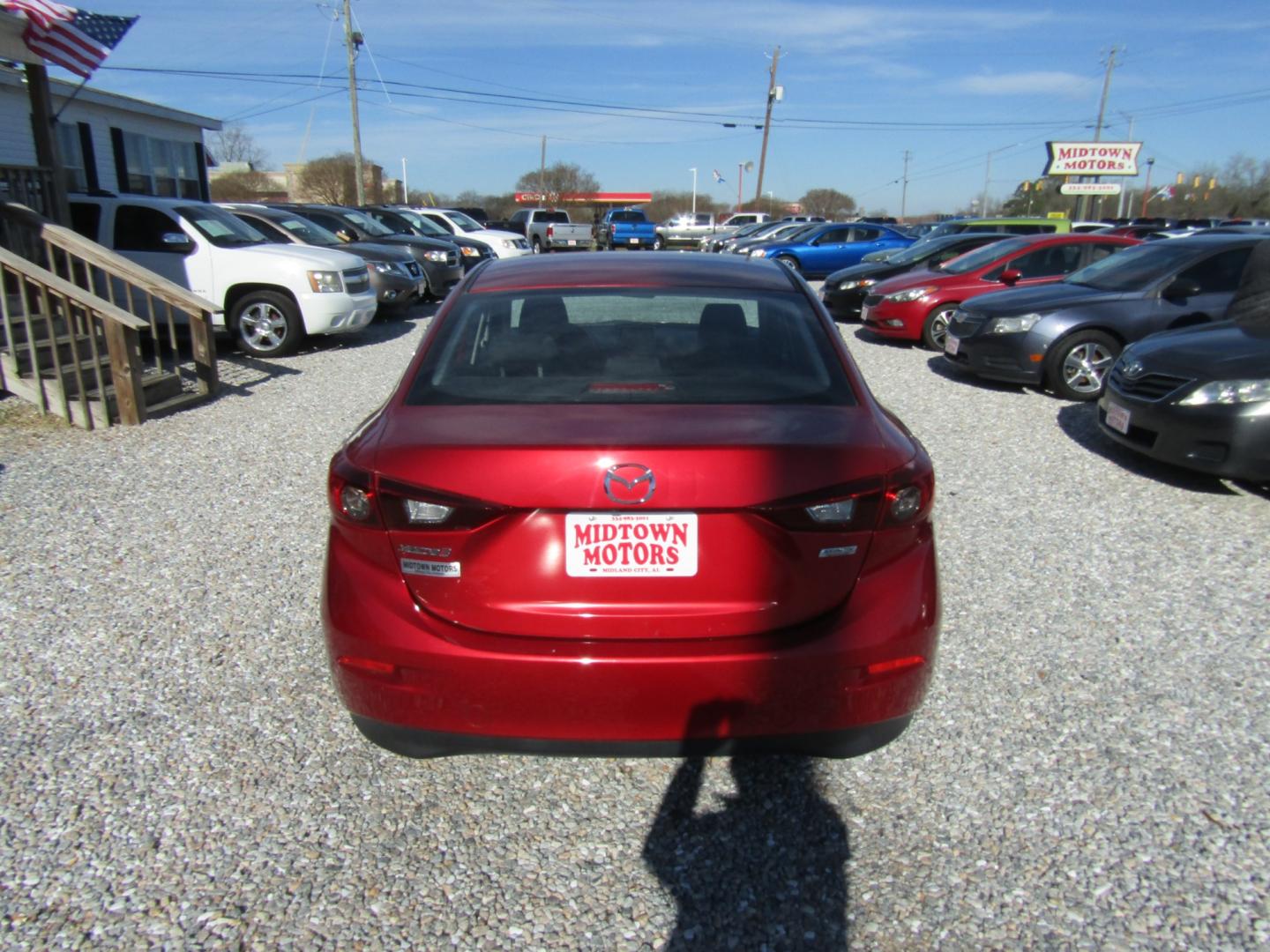 2016 Red Mazda MAZDA3 i Sport AT 4-Door (JM1BM1T74G1) with an 2.0L L4 DOHC 16V engine, Automatic transmission, located at 15016 S Hwy 231, Midland City, AL, 36350, (334) 983-3001, 31.306210, -85.495277 - Photo#6